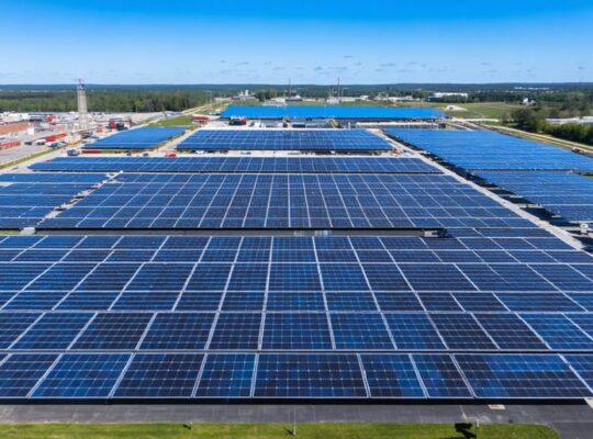 Conceptual representation of Virginia emerging as a solar manufacturing hub, with solar panels and industrial structures set against a backdrop of iconic Virginian landscapes.