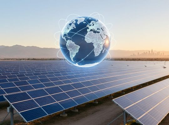 Utility-scale solar panels at golden hour with a translucent globe above them and glowing lines linking continents, distant mountains and a subtle skyline in the background, representing global PV data integration.