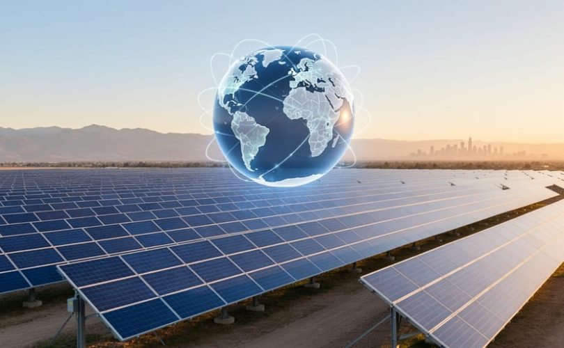 Utility-scale solar panels at golden hour with a translucent globe above them and glowing lines linking continents, distant mountains and a subtle skyline in the background, representing global PV data integration.